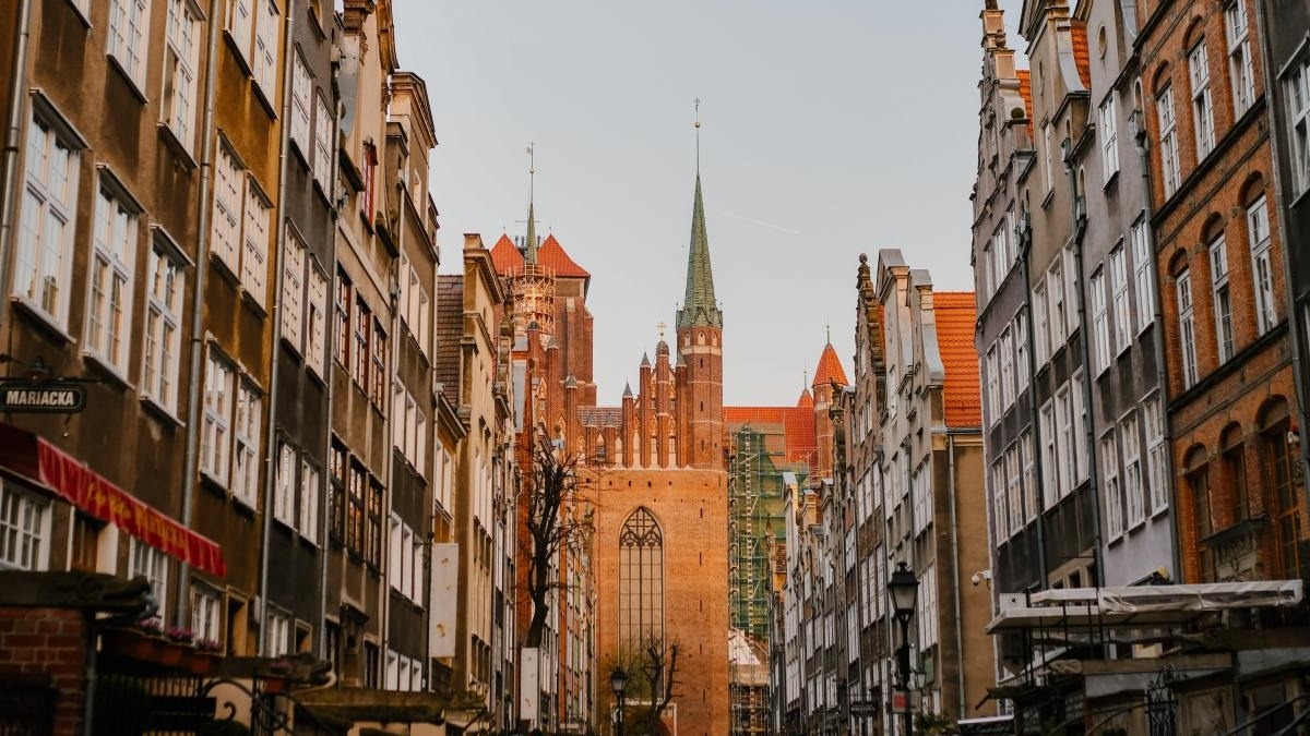 Pedestrian street between buildings.