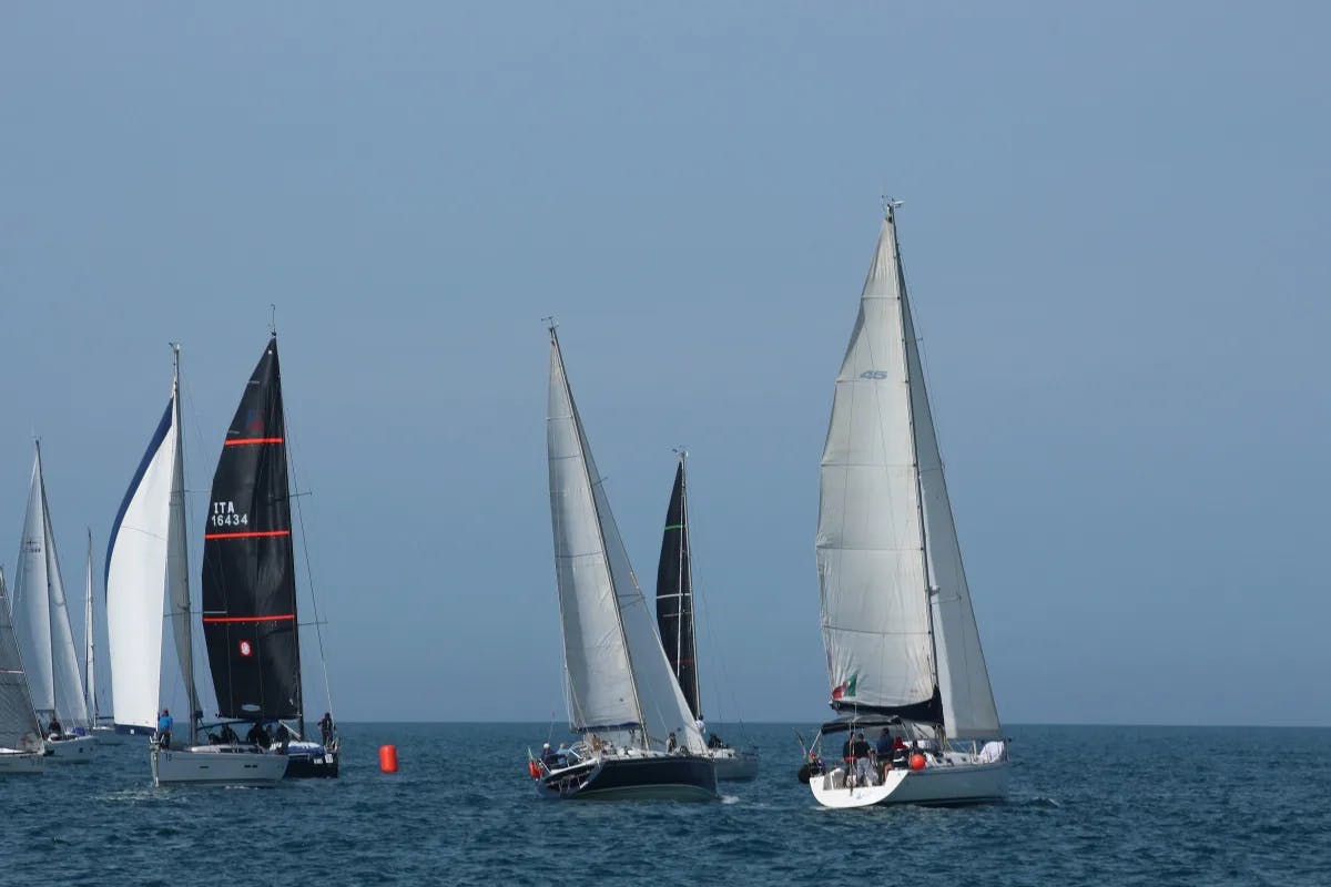 Sailboats cruise at the Adriatic waters.