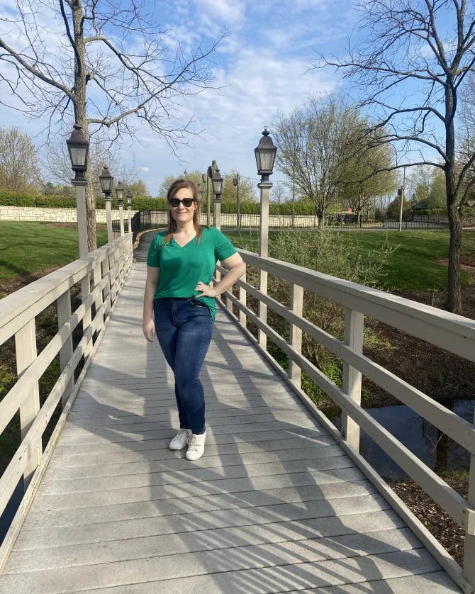 Picture of Chelsea in green shirt on a bridge