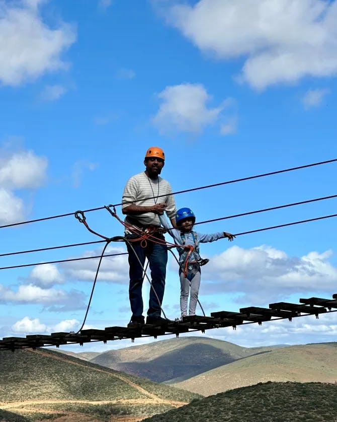 man on tightrope