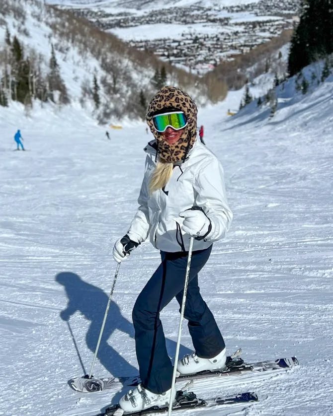 Travel advisor posing in a snowy region