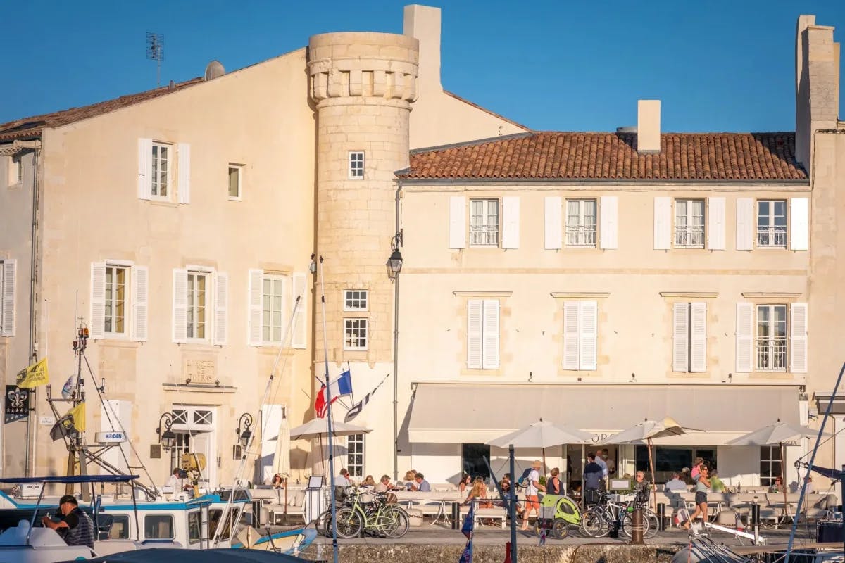 beige stone building exterior in a seaside village