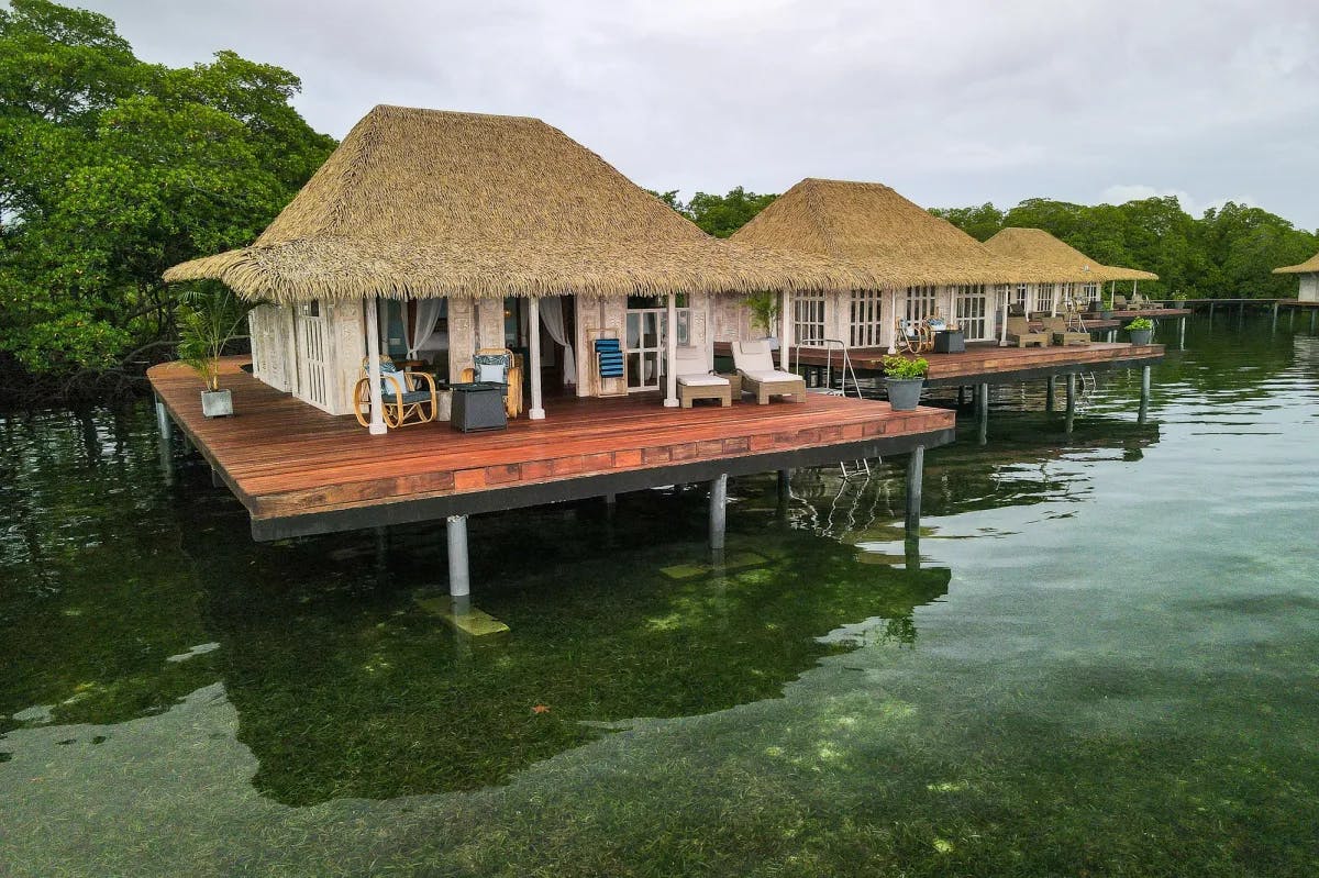 overwater bungalows near the jungle