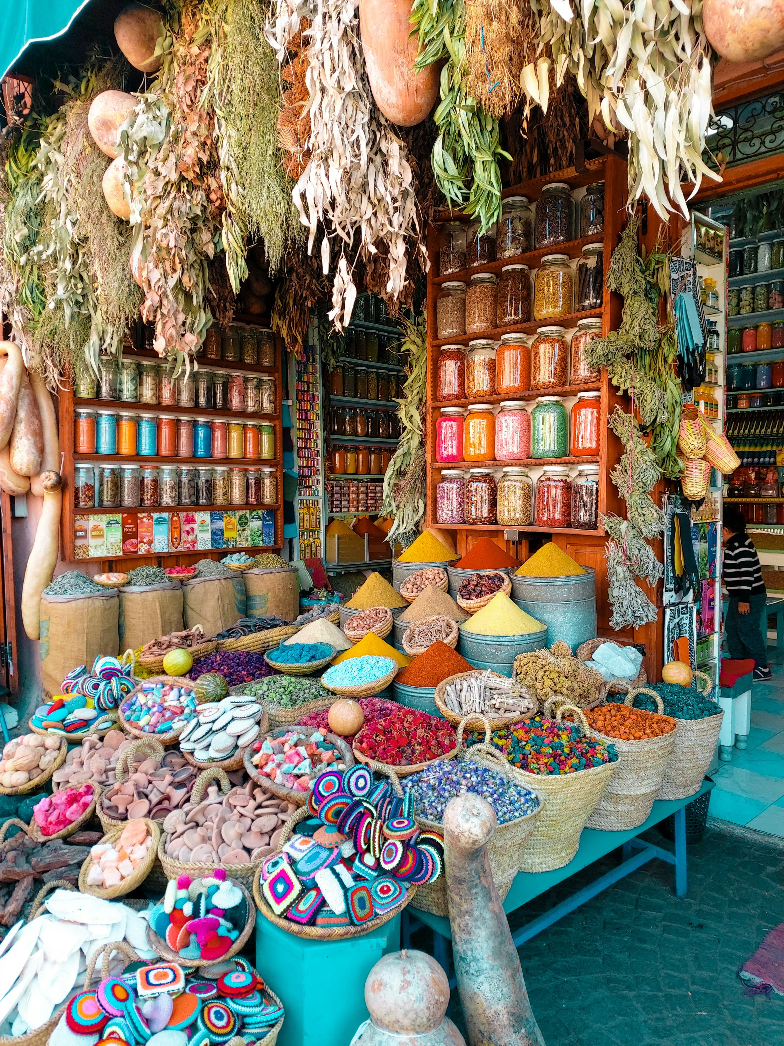 Assorted colors of wicker baskets in a market display