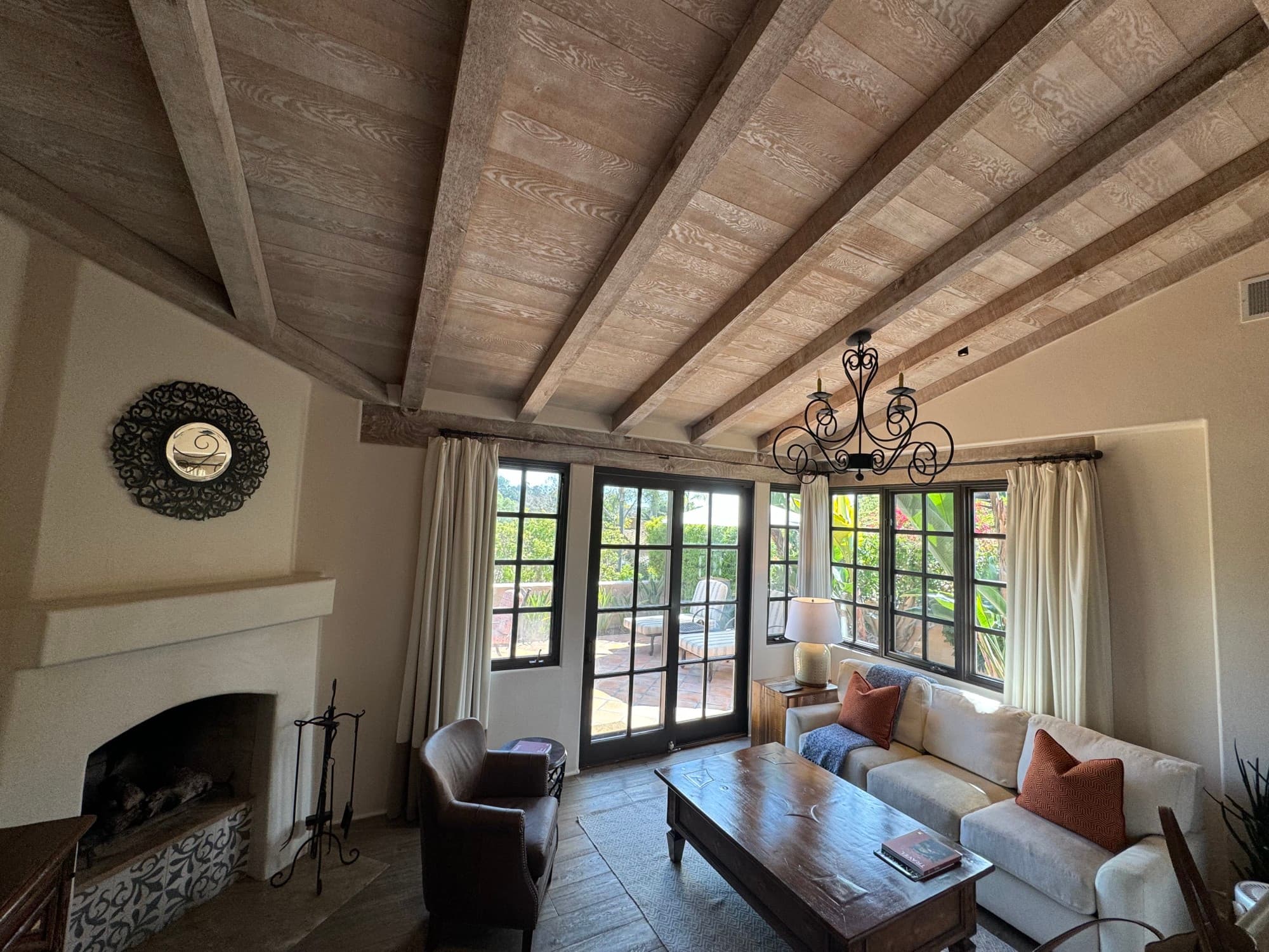 Suite with a white couch and picture frame windows.