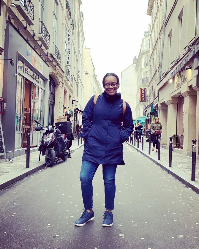 Travel advisor Shana Kinsey posing in the middle of street.