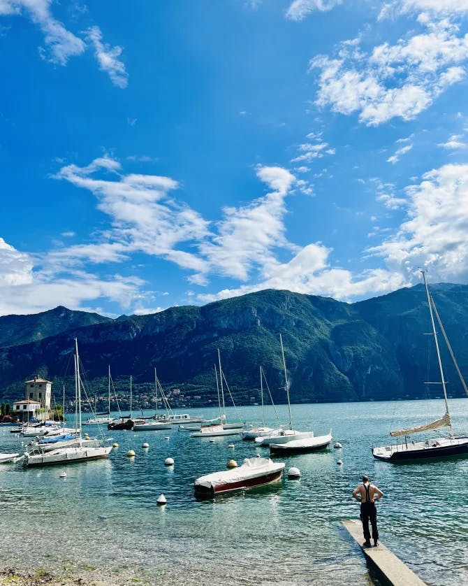 Boats anchored on sea shore