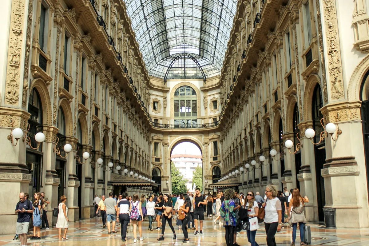 People shopping inside of Galleria Vittorio Emanuele II in Milan.