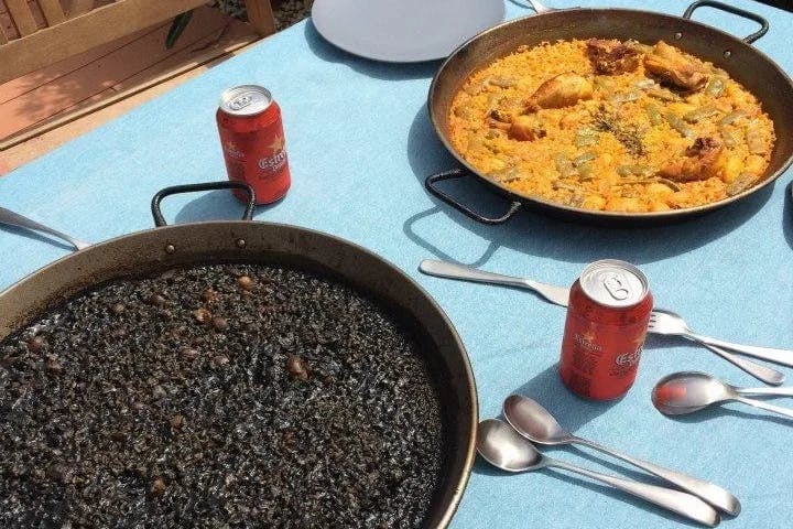 Two kinds of Paella - traditional and squid ink