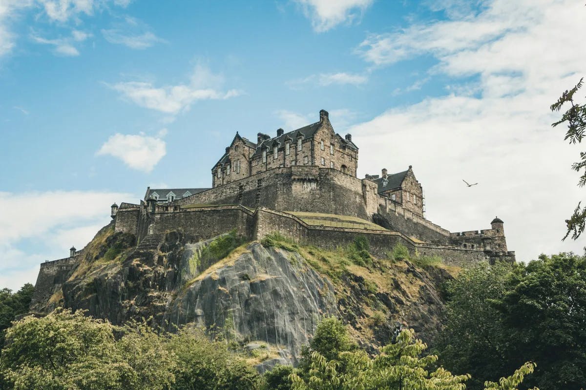 A view of Edinburgh Castle perched ontop of a hill