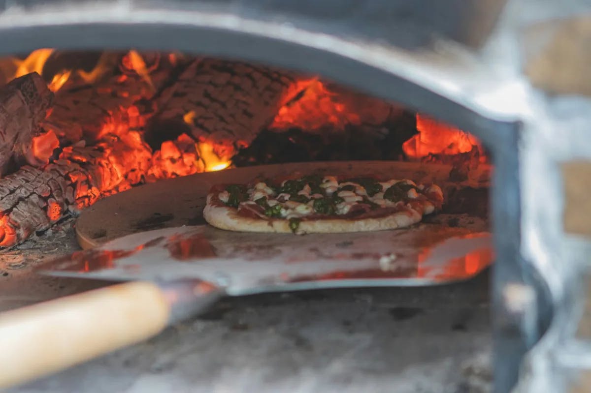 Pizza in a wood-fired oven.