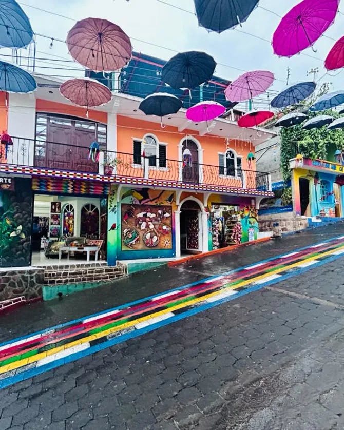 A beautiful view of street with umbrellas