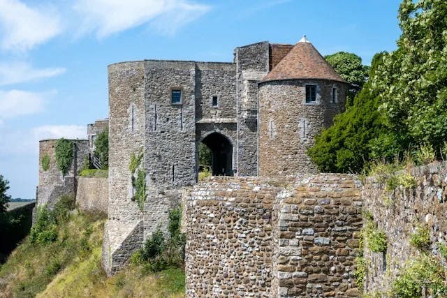 A-stone-castle-on-a-hill-with-trees-around-it