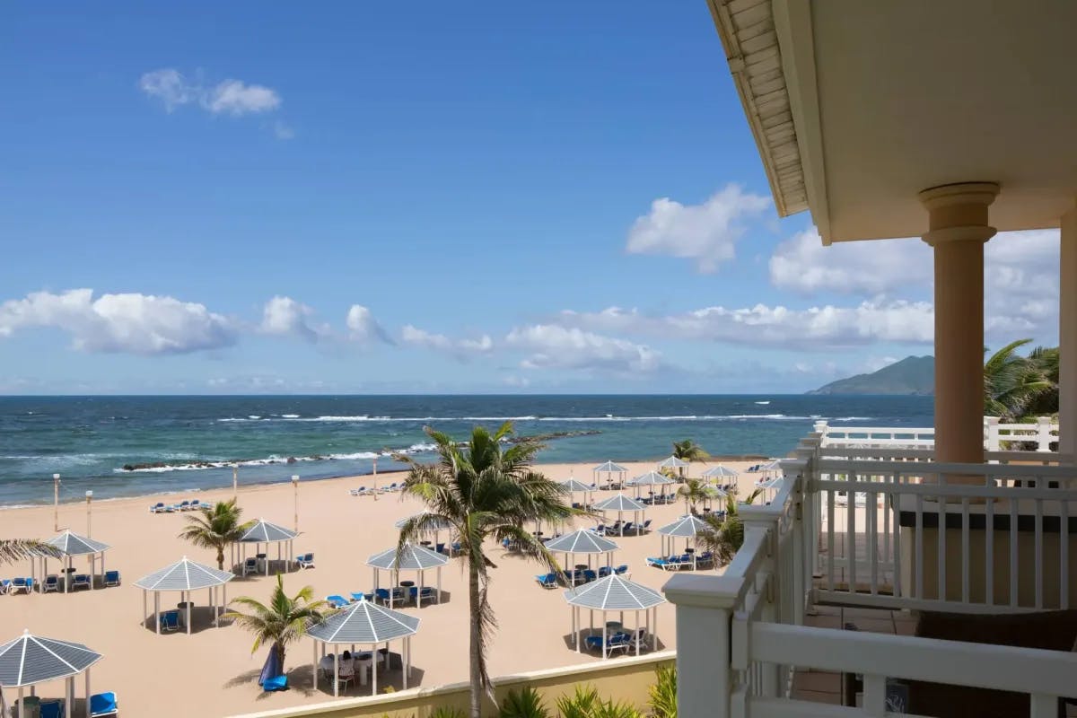 Dozens of gazebos fill an otherwise pristine Caribbean beach 