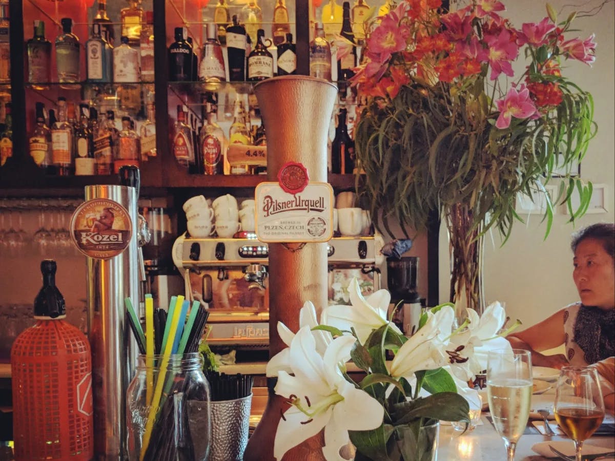 A bar with wine bottles. 