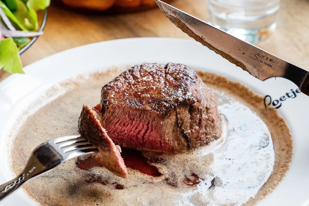 Steak on a white plate