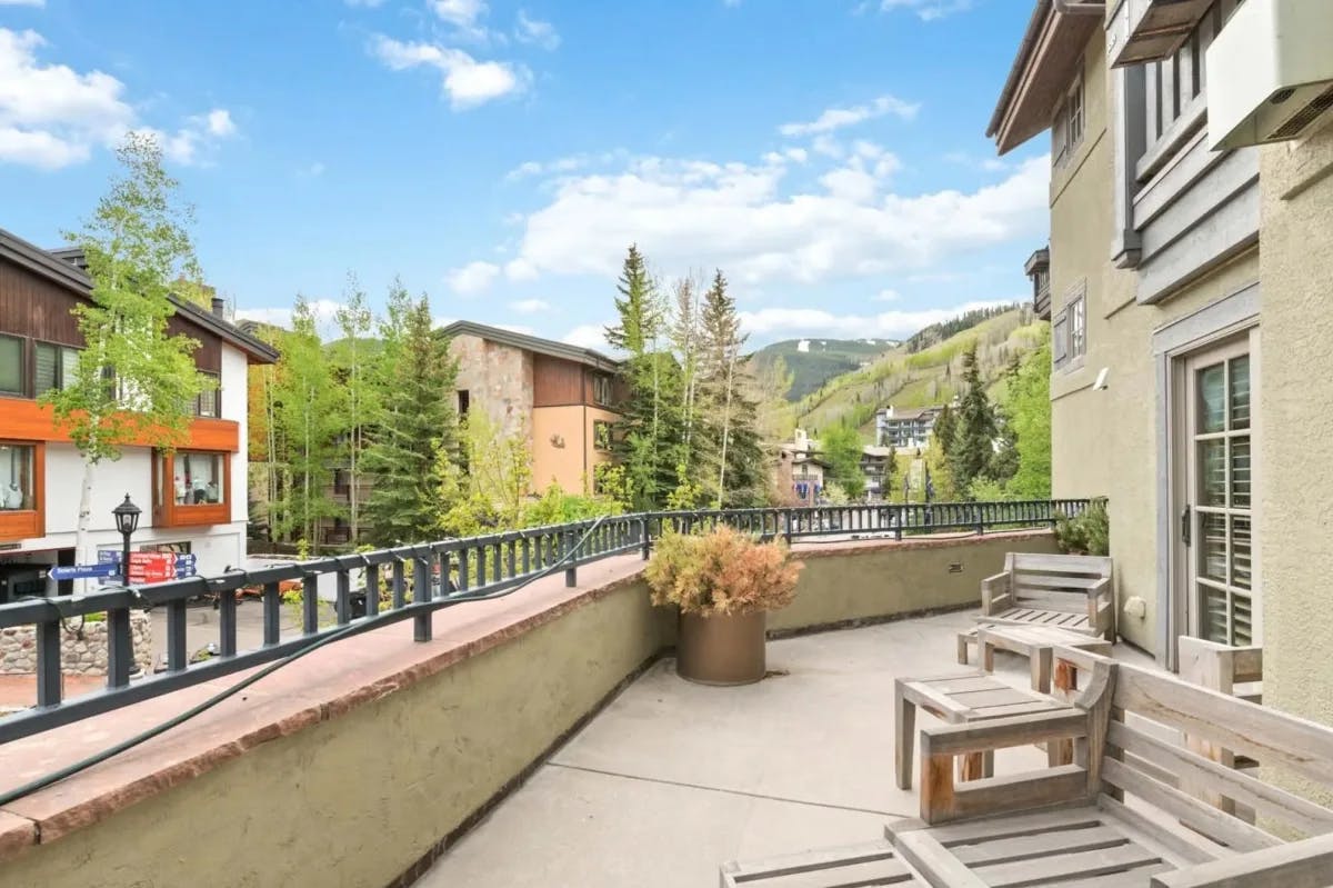 view from a balcony of vail and mountains beyond