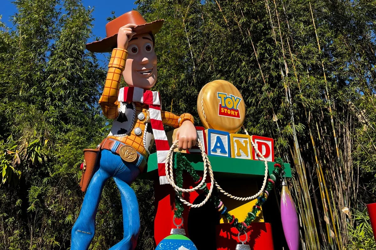 A picture of toy story characters statue during daytime