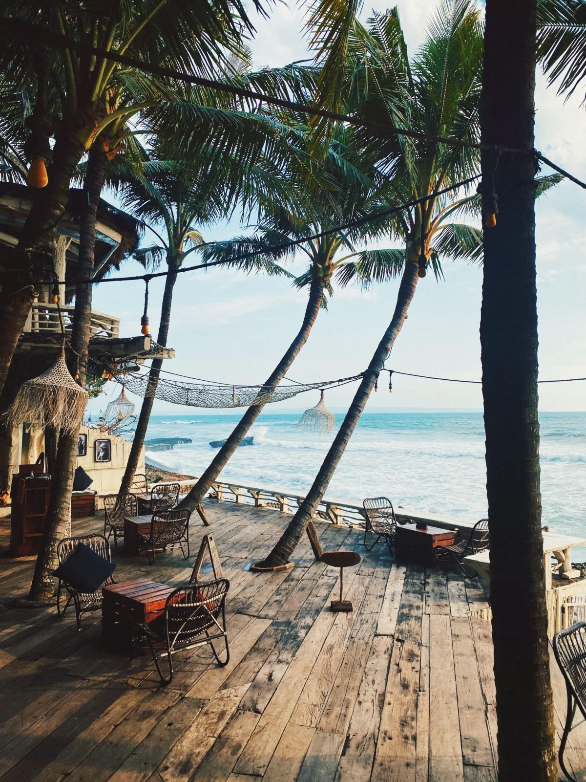 Wooden hut hotel in Bali with ocean views. 