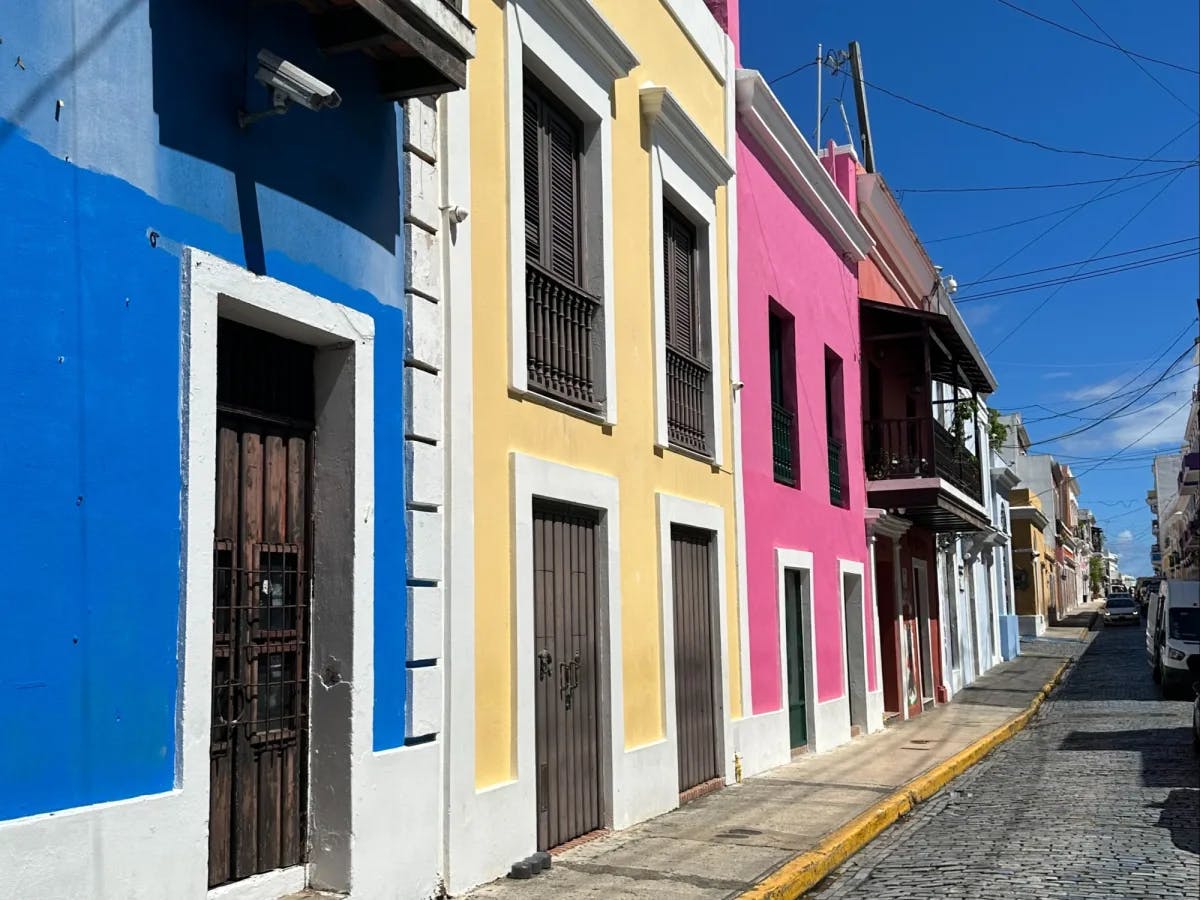 Colorful buildings on a street. 