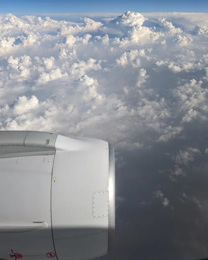 View of the clouds from plane window