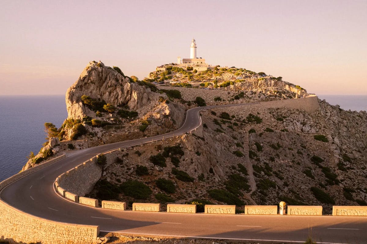 Winding road leading to a lighthouse 