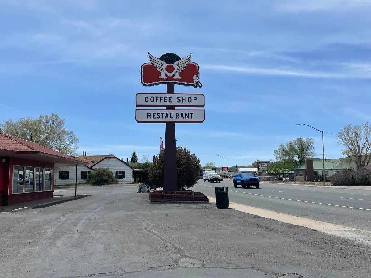 Coffee board on a road