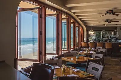 Splashes restaurant is a new american spot inside the Surf & Sand Resort with on-the-ocean dining & palm-shaded patios.