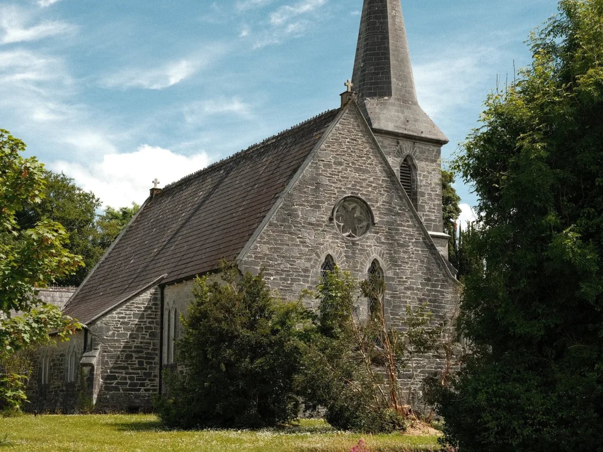 Grey church during daytime.