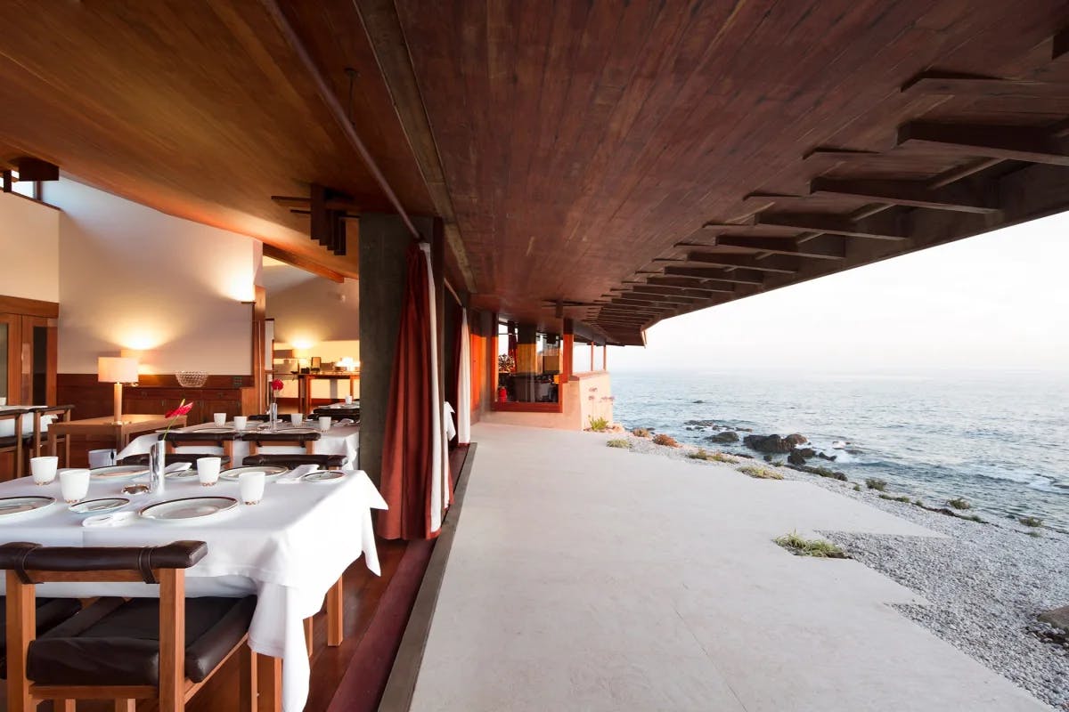 Dining and facing the view of the Atlantic coast. 