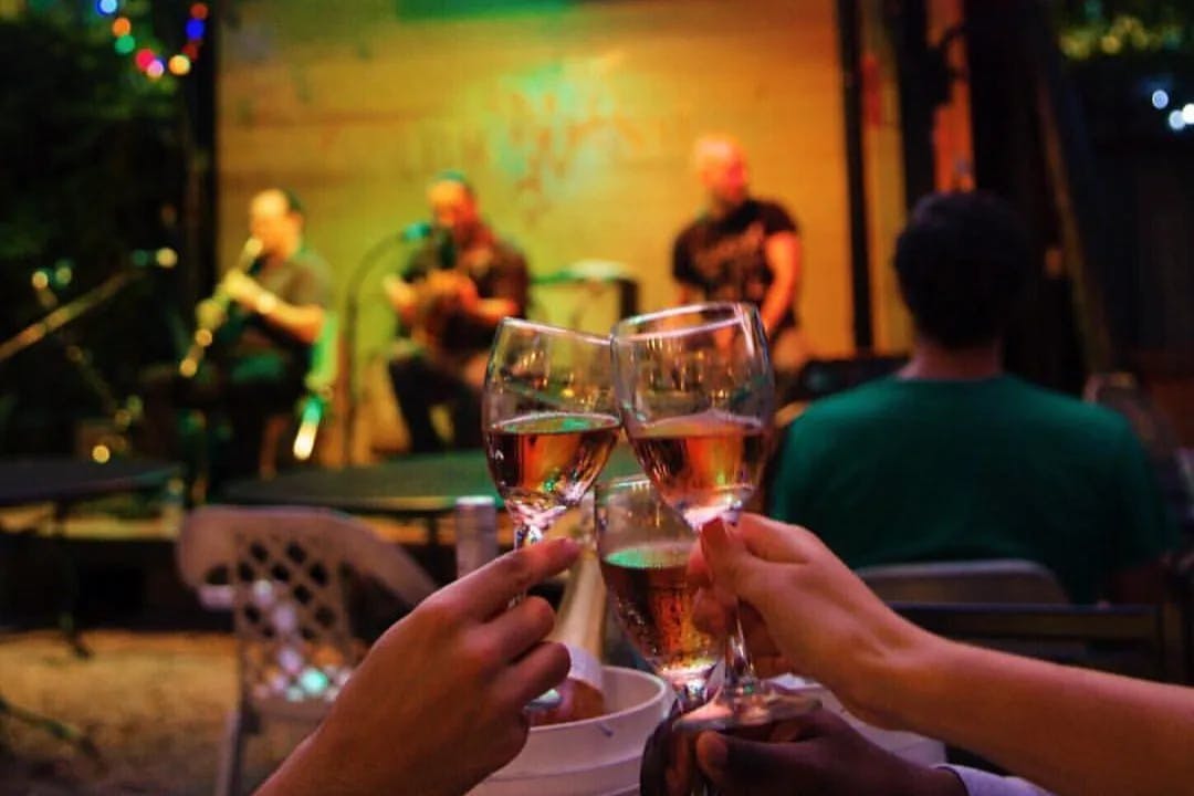 Bacchanal Fine Wine & Spirits is a wine bar featuring globally accented small plates & live music on a lush back patio.