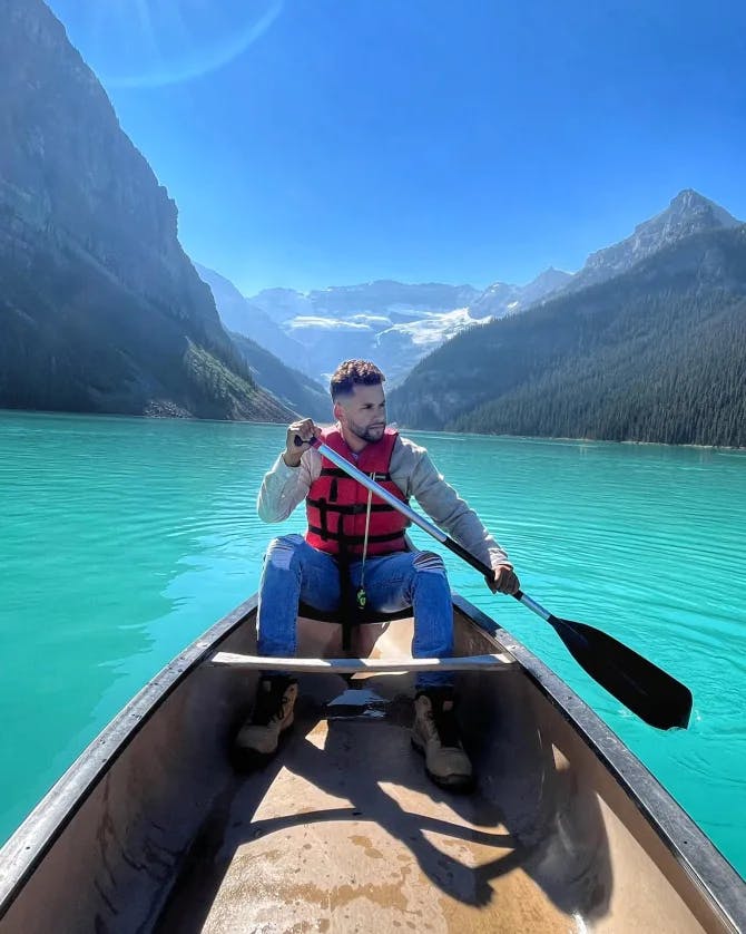 A man rowing a boat.