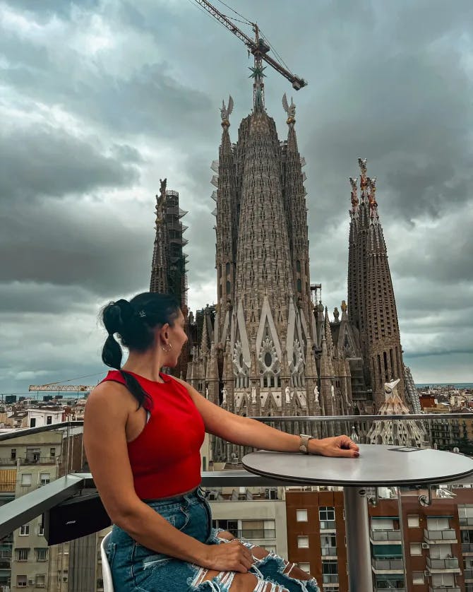 Samar Asfour posing at a table in Spain