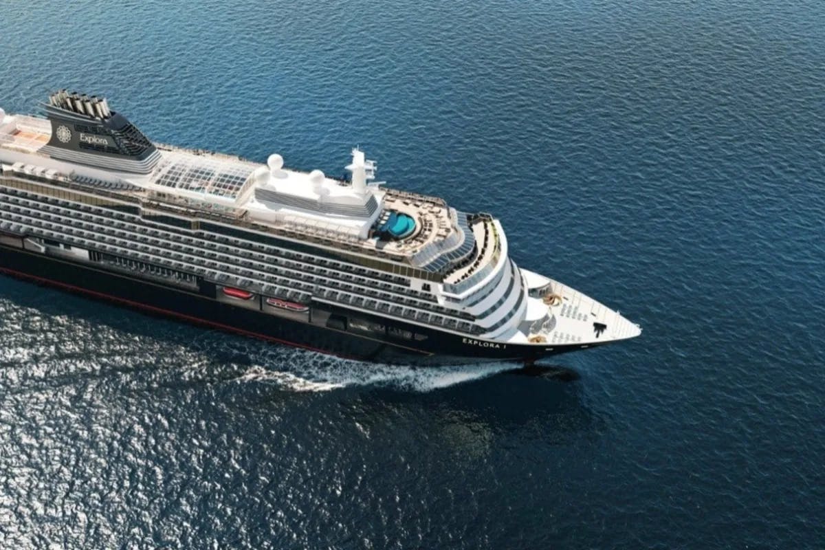 aerial shot of cruise ship and ocean