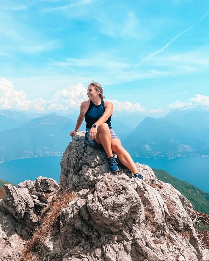 Picture of Gianna sitting on rock