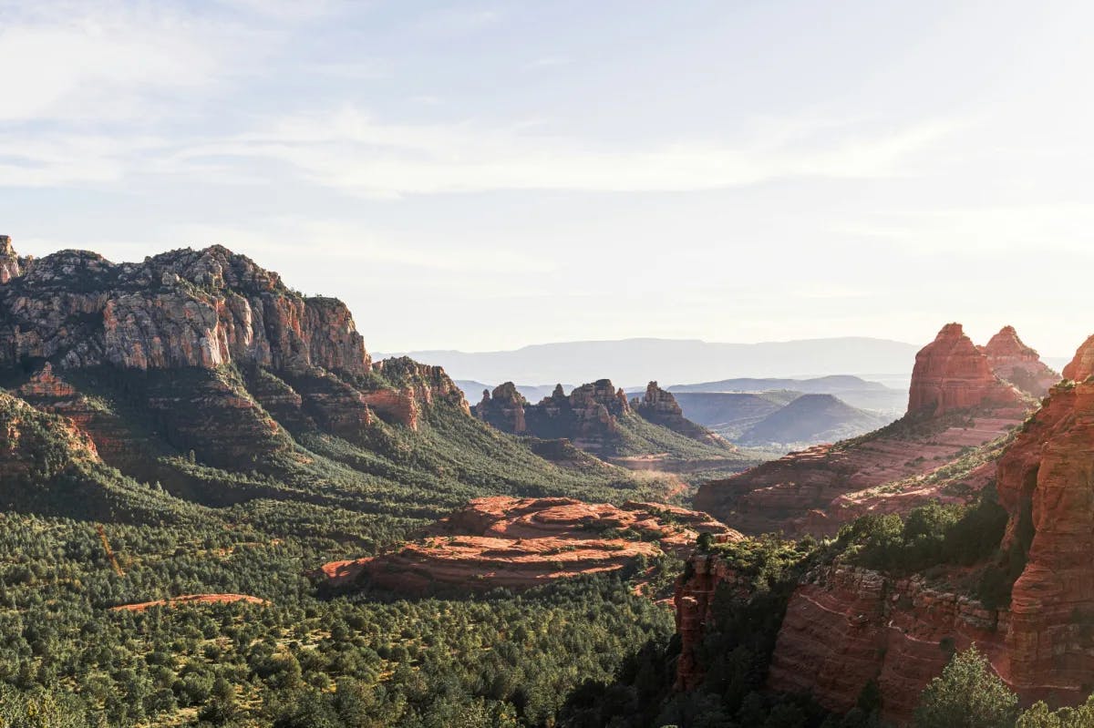 Landscape with dry rocky and green mountains.