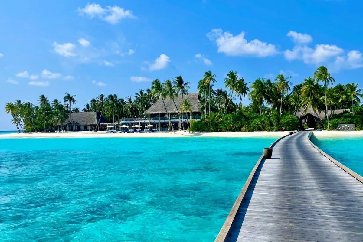 Boardwalk leading to a resort in Maldives.