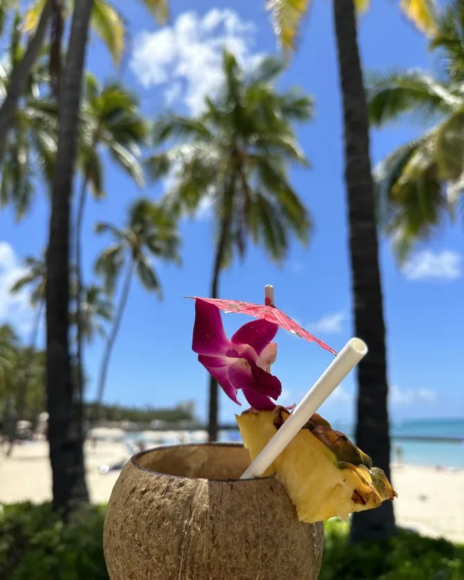 Coconut water beside sea