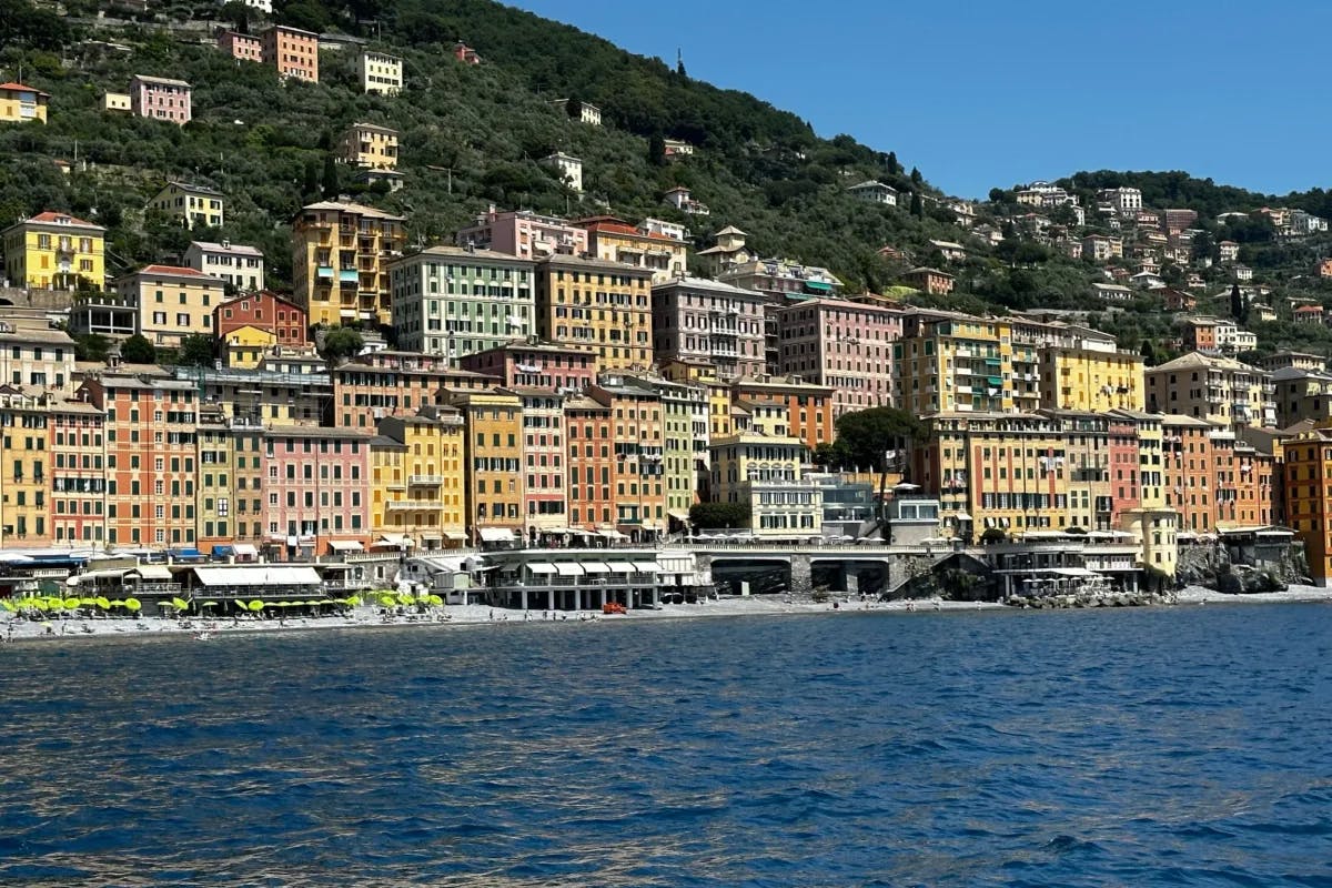 View from the water of a coastal sea-side town with colorful buildings