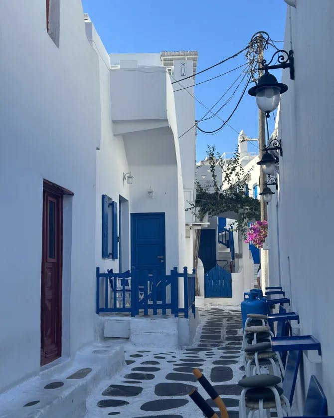 A beautiful narrow street in Greece on a sunny day. 