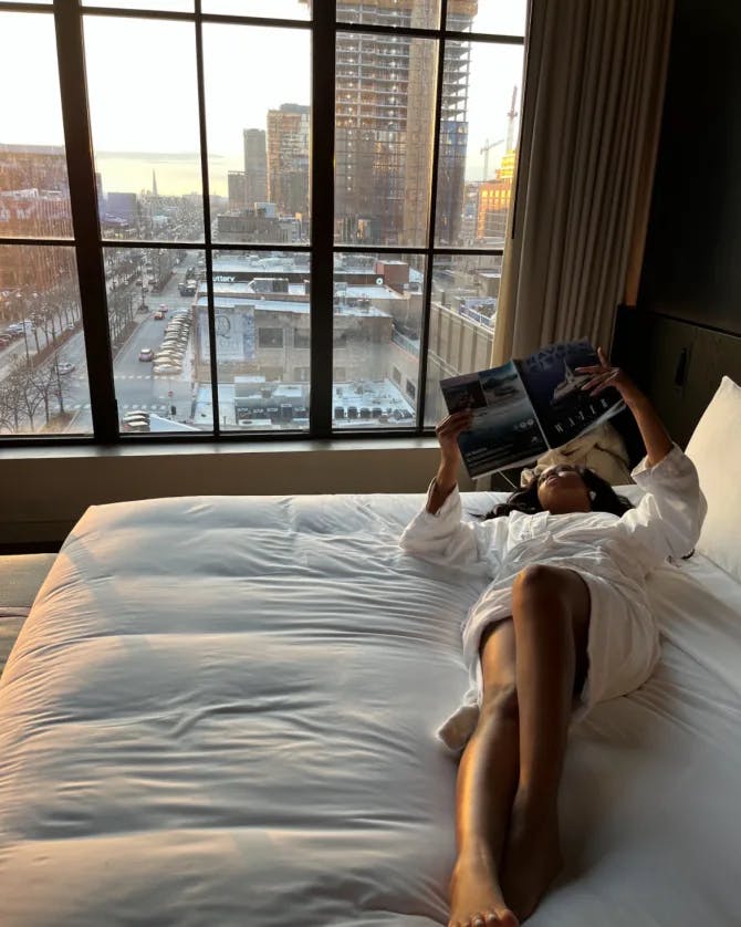 reading book on bed