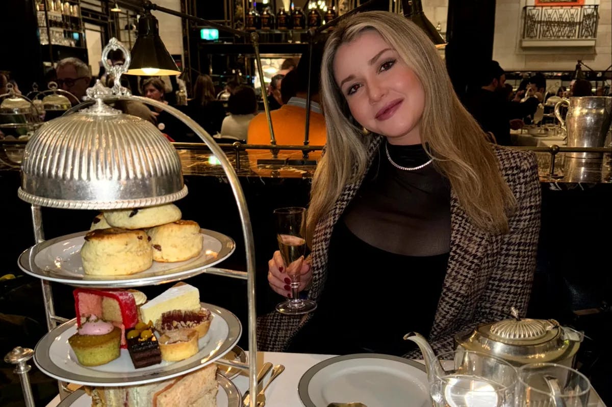 a-woman-at-afternoon-tea-london-travel-guide