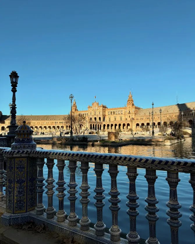 Beautiful view of the Plaza de Espana in Seville as seen from a bridge on a sunny day