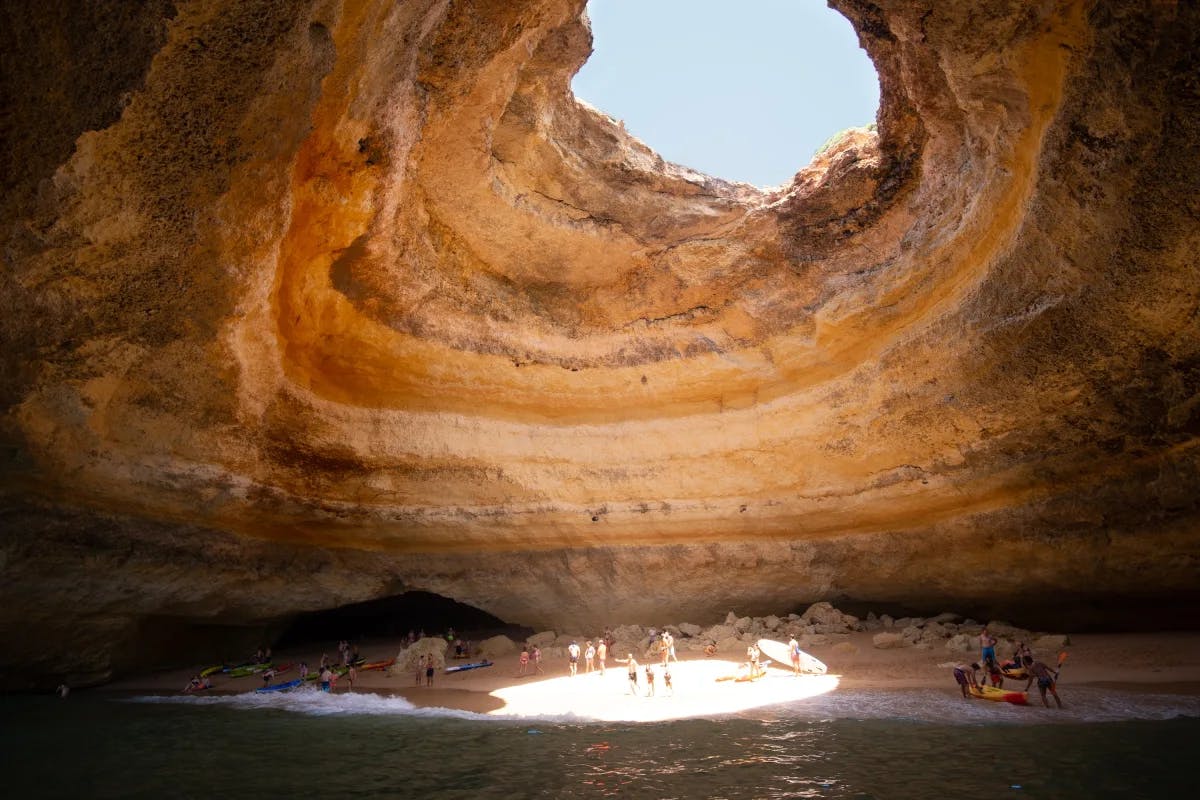 Benagil Cave is a remarkable seaside cave, reachable by boat trip, known for a distinctive hole in its roof.