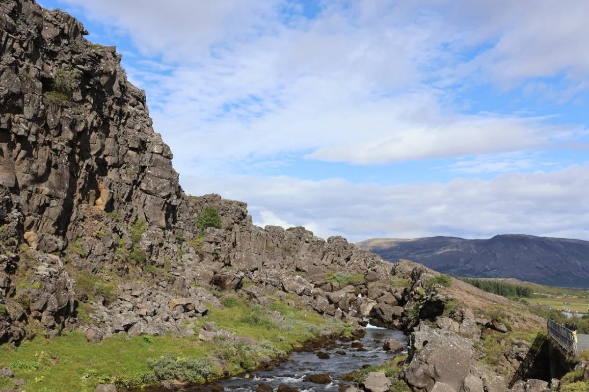 A rocky area in a field during the daytime