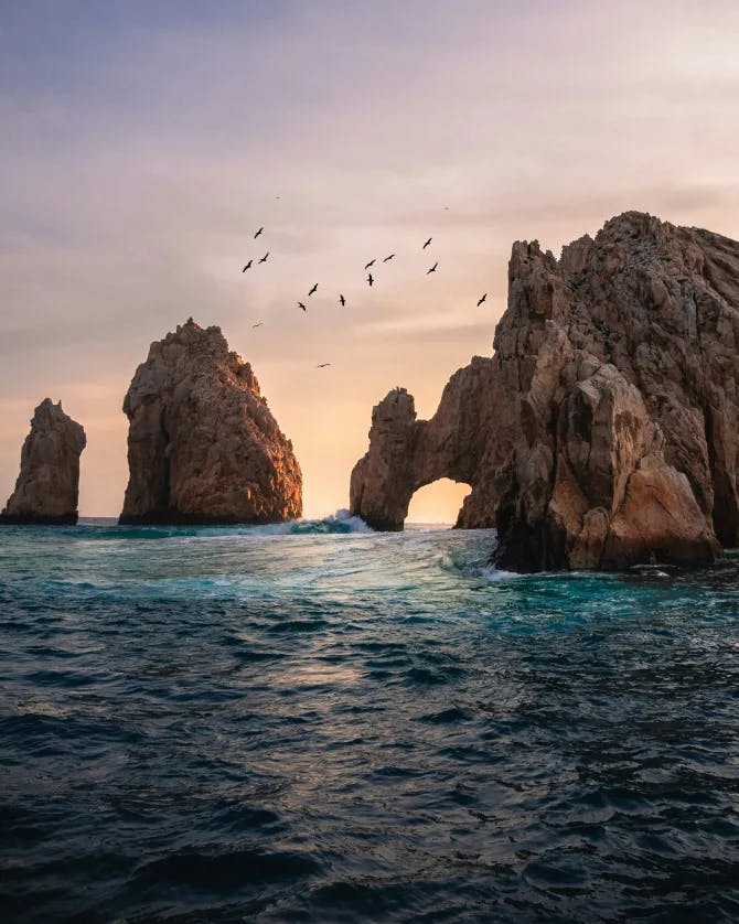 A lovely view of the ocean with caves in Cabo San Lucas. 