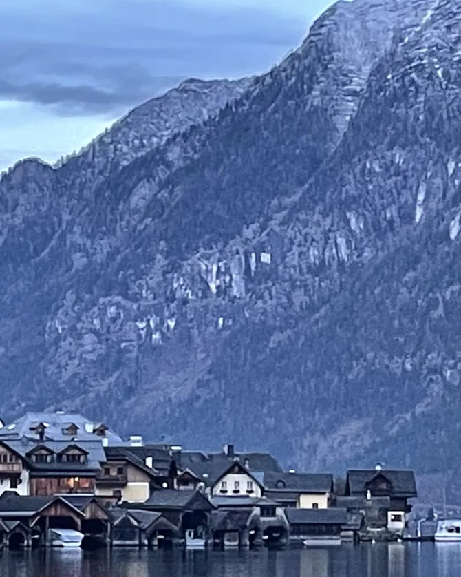 Picture of houses with beautiful mountains and lake