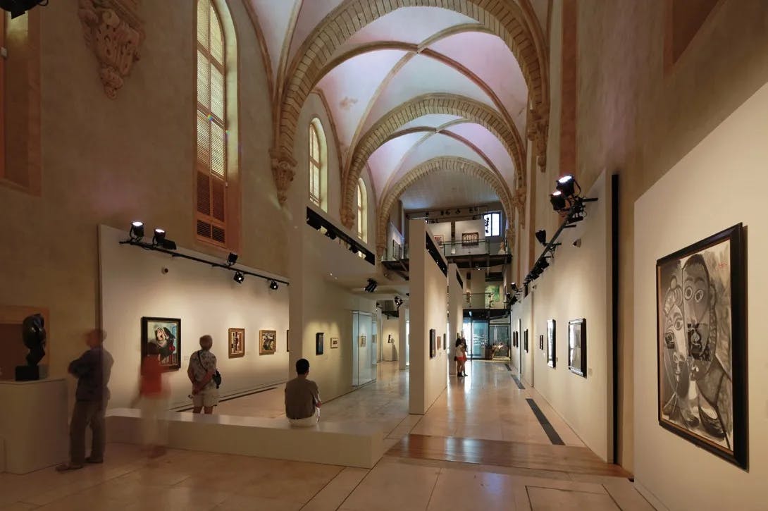 Inside the Granet Museum's (Musee Granet), with domed ceilings, soft lighting, and walls decorated with glorious masterpieces.