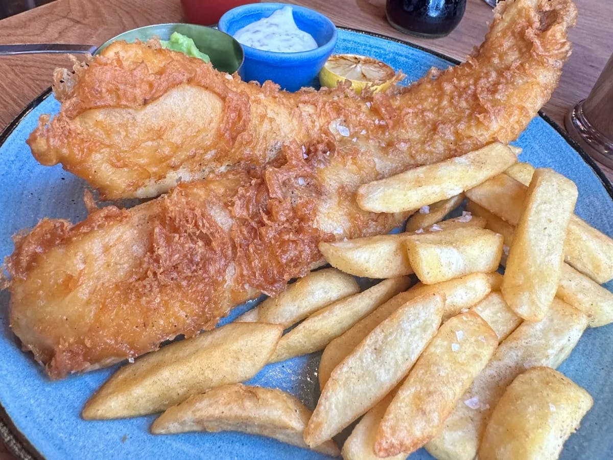 A plate of fish and chips. 