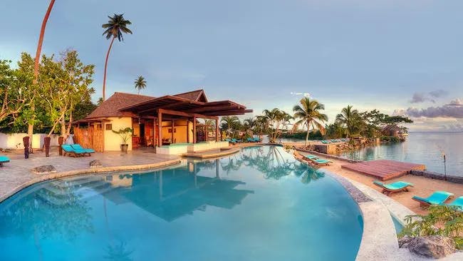 A resort in daytime with water in the surrounding